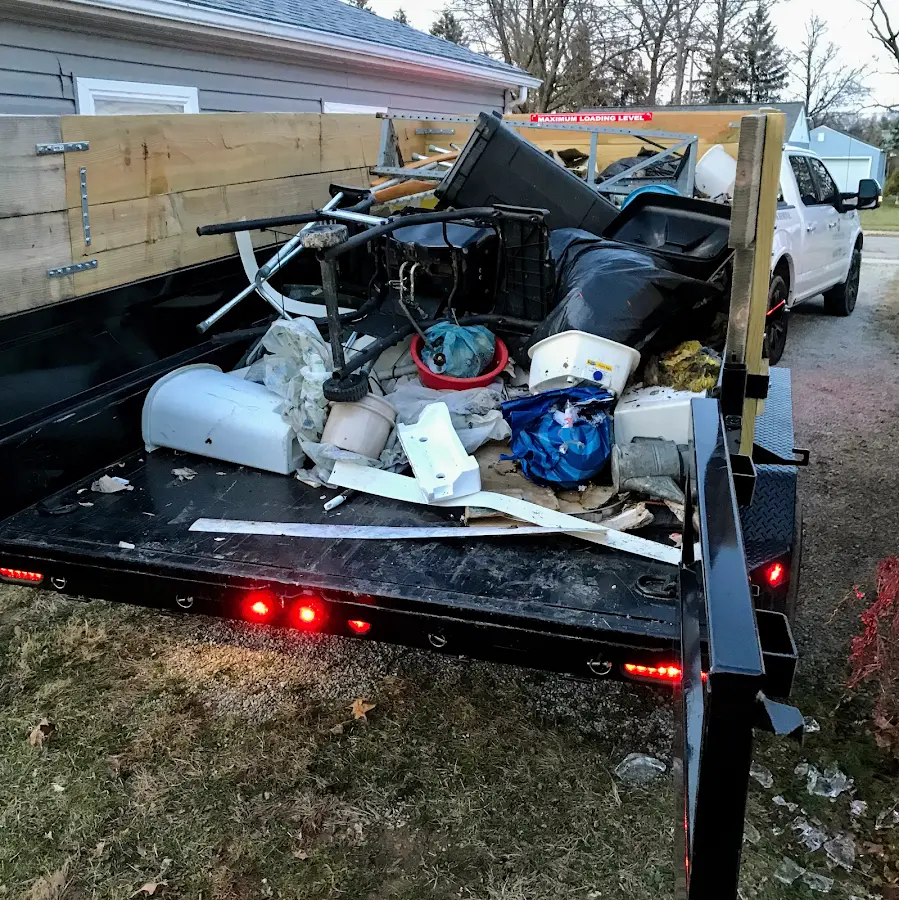 Roll-off dumpster delivered to a residential driveway in Sherburne