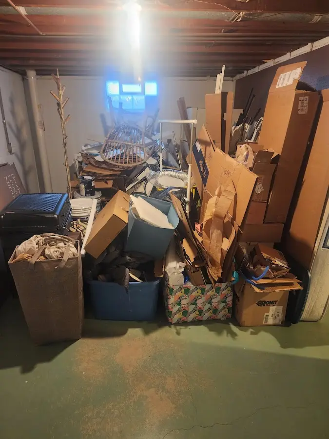 Roll-off dumpster container at job site for Construction Dumpster Rental in Sherburne